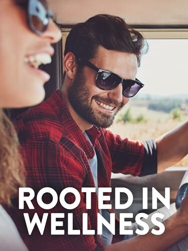Smiling couple driving in a car with sunglasses