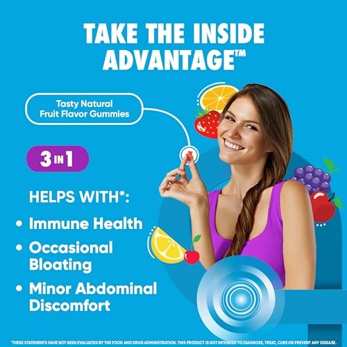 Woman holding a gummy vitamin with benefits for immune health, bloating, and abdominal discomfort.