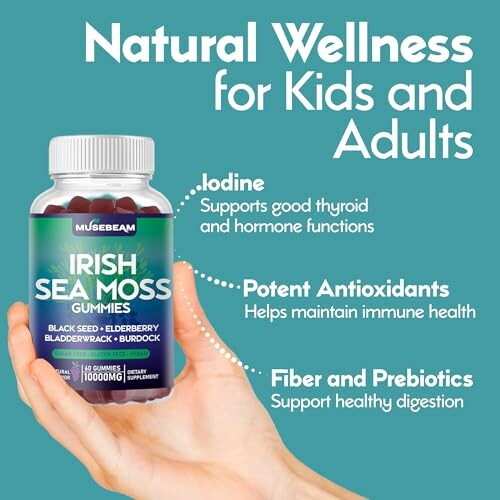 Hand holding Irish Sea Moss Gummies bottle with health benefits.