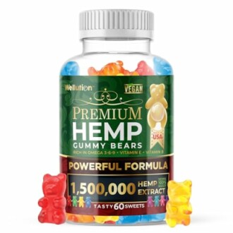 Bottle of premium hemp gummy bears with colorful gummies around it.