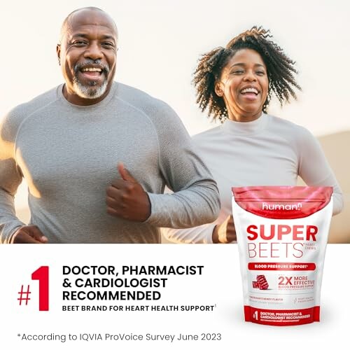 Smiling couple jogging with SuperBeets heart health supplement.