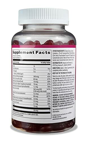 Bottle of gummy vitamins with supplement facts label.